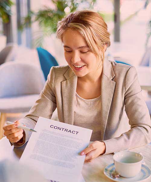 Customer and advisor reviewing loan documents